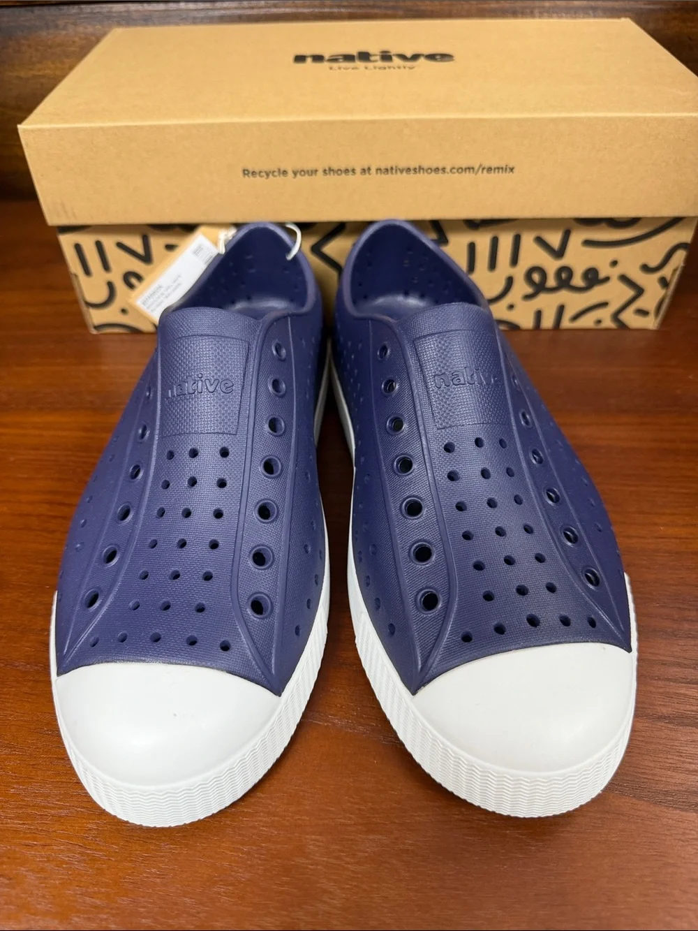 Kids NATIVE Jefferson Slip-On Sneakers in Navy with White Toe